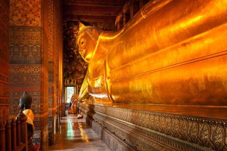 Reclining golden Buddha statue. Wat Pho, Bangkok, Thailand