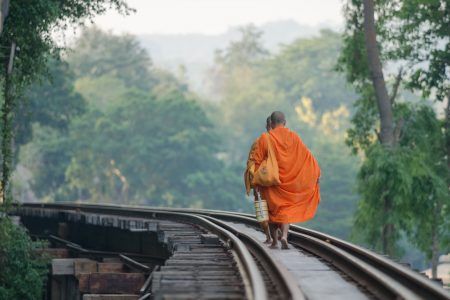 The monks walking on the Death Railway,Kanchanaburi, Thailand