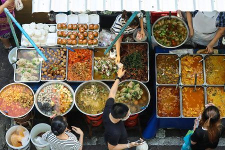 Top view of Thai food street, Market in Thailand is full of food. And it will sell on the street. Food Street Market in Bangkok offers delicious