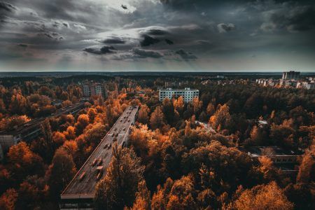 Chernobyl Exclusion Zone. Ruins of the abandoned city of Pripyat. Autumn in the exclusion zone. High radioactivity zone. Panoramic view of the ghost town. Ruins of buildings. Chernobyl. In Ukraine.