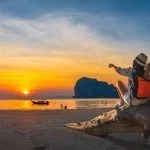Romantic couple traveler joy look beautiful nature at sunset Pak Meng beach Outdoor lifestyle attraction travel Trang Thailand exotic beach