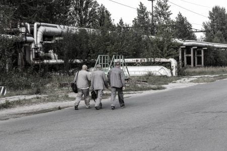 Workers go to Reactor 4 at the Chernobyl nuclear power plant with a new confinement. Global atomic disaster. Chernobyl Exclusion Zone