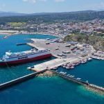 Aerial drone bird’s eye panoramic view of famous port and city of Rafina with passenger ferries travel to Aegean islands, Attica, Greece2