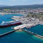 Aerial drone bird’s eye panoramic view of famous port and city of Rafina with passenger ferries travel to Aegean islands, Attica, Greece2