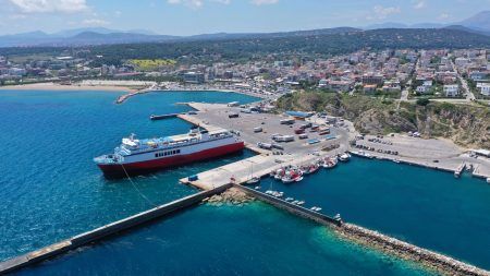 Aerial drone bird’s eye panoramic view of famous port and city of Rafina with passenger ferries travel to Aegean islands, Attica, Greece2
