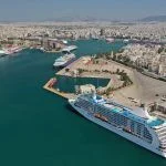 Aerial drone panoramic photo of busy port of Piraeus, the largest in Greece and one of the largest passenger ports in Europe, Attica, Greece
