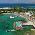 Aerial drone photo of beautiful exotic peninsula of Grand Resort Lagonisi or Lagonissi a definite summer destination, Athens riviera, Attica, Greece2