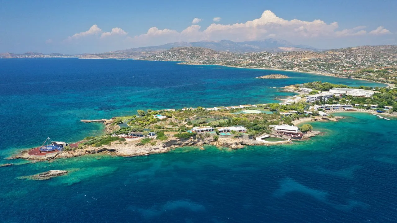Aerial drone photo of beautiful exotic peninsula of Grand Resort Lagonisi or Lagonissi area a definite summer destination, Athens riviera, Attica, Greece