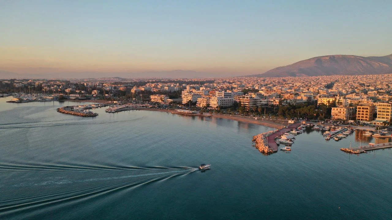Aerial drone photo of port of famous district of South Athens riviera – Glyfada at sunset, Attica, Greece