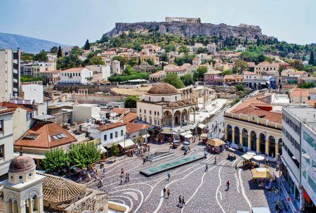 Aerial panoramic view of Monastiraki square and the Acropolis in Athens, Greece.