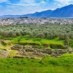 Aerial panoramic view of Sparta city with Taygetus mountains and ancient ruins remains in Peloponnese, Greece