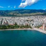 Aerial photo over Volos city and the port in Magnesia, Greece