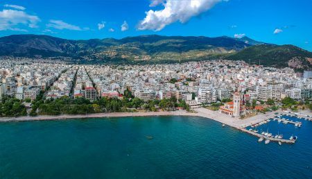 Aerial photo over Volos city and the port in Magnesia, Greece