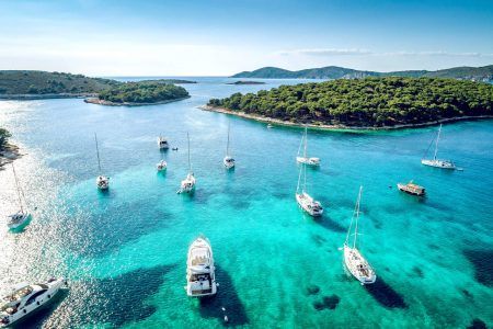 Aerial view of Paklinski Islands in Hvar, Croatia. Turquoise water bays with luxury yachts and sailing boats. Toned image. (2)