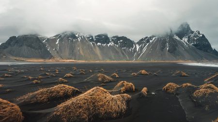 Cape Stokksnes and Mount Vestrahorn. A landscape with a popular tourist attraction in Iceland. An exciting trip to the sight of monuments in winter
