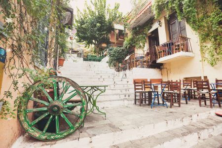 Charming street in the old district of Plaka in Athens, Greece