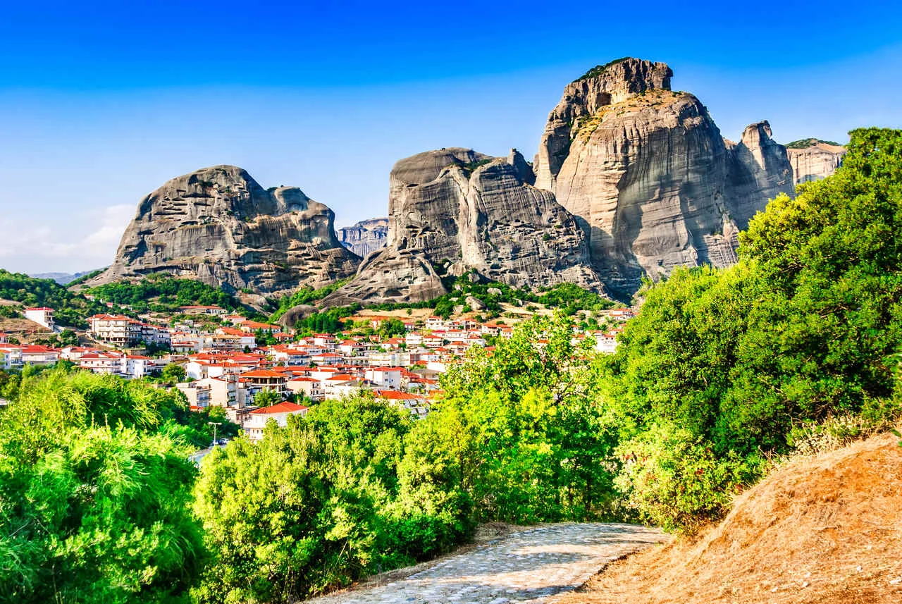 Kalabaka, Greece. City Kastraki (Kalambaka) with rocky mountains of Meteora, the landmark of six monasteries in Thessaly.