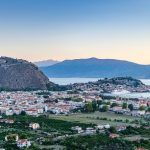 Nafplio town view from Profitis Ilias hill at sunset. Peloponnese, Greece.