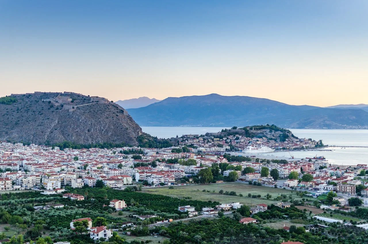 Nafplio town view from Profitis Ilias hill at sunset. Peloponnese, Greece.