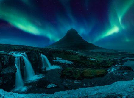 Northern Light, Aurora borealis at Kirkjufell in Iceland. Kirkjufell mountains in winter.