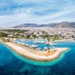 Panoramic aerial view to the coastline of Glyfada district, south Athens, Greece, with yacht marinas, beaches and turquoise sea