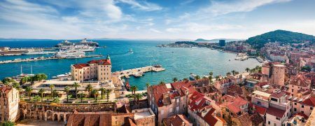 Panoramic summer landscape of an old medieval city – Split, Croatia, Europe. Sunny sea morning on the Adriatic Sea. The beautiful world of the Mediterranean countries. Travel concept background.