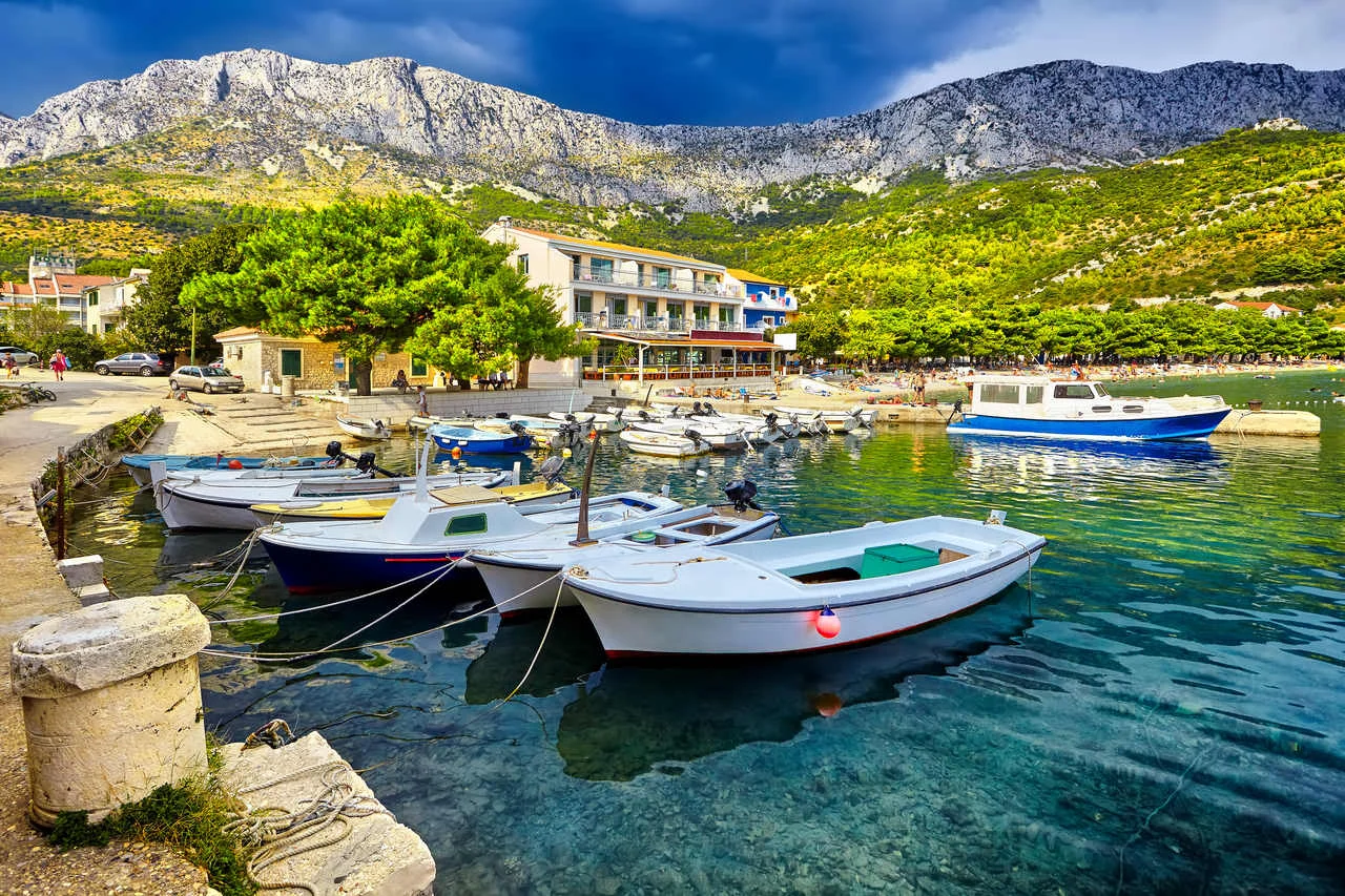 The beautiful scene of boats lying in the harbor of Drvenik, Croatia, Adriatic Sea beach. Artistic picture.