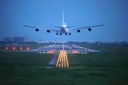 passenger plane fly over take off from airport