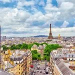 Beautiful view of Paris from the roof of the Pantheon. View of the Eiffel tower and the flag of France.