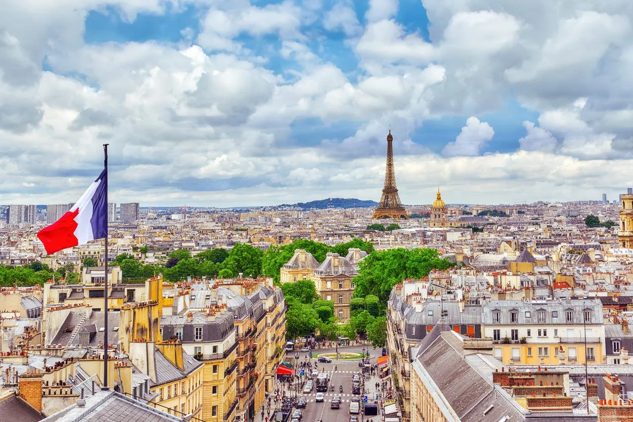 Beautiful view of Paris from the roof of the Pantheon. View of the Eiffel tower and the flag of France.