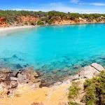 Cala Llenya in Ibiza with turquoise water in Balearic islands