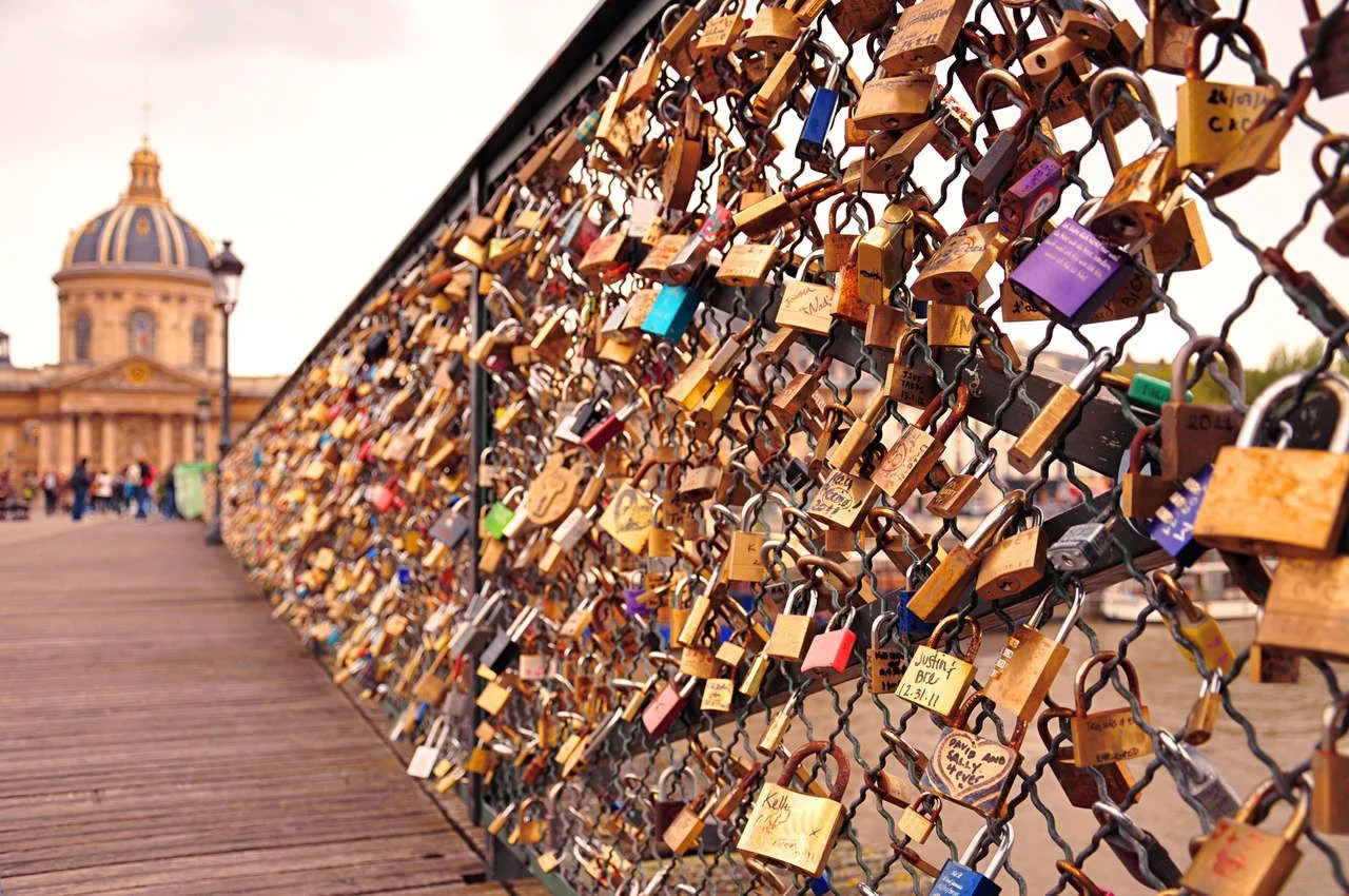 Closeup of the symbolic colourful padlocks on Pont des Arts bridge, Paris, France louvre
