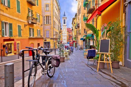 Nice colorful street architecture and church view, touristic destination of French Riviera, Alpes Maritimes depatment of France