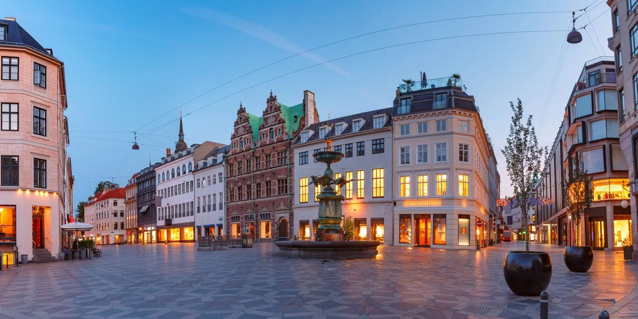 Panorama of Amagertorv square, Stroget street during morning blue hour, Copenhagen, capital of Denmark