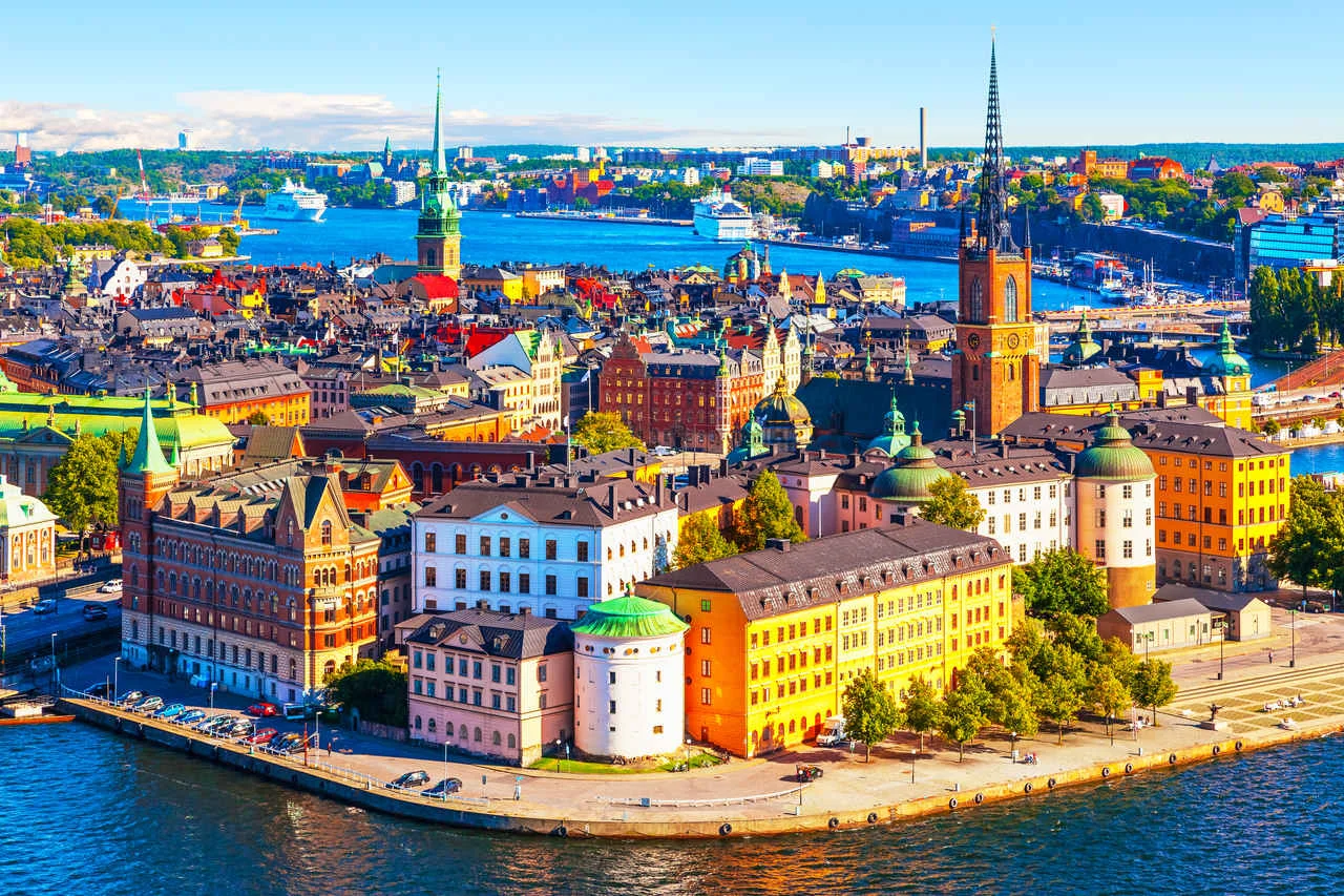 Picturesque summer panorama of the pier in the Old Town (Gamla Stan) of Stockholm, Sweden