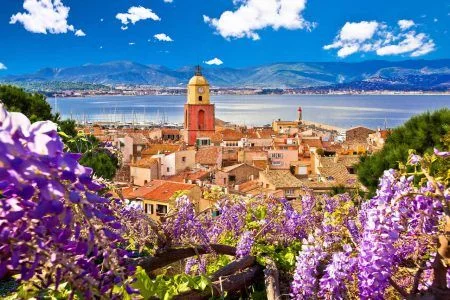 Saint Tropez village church tower and old rooftops view, famous tourist destination on Cote d Azur, Alpes-Maritimes department in southern France