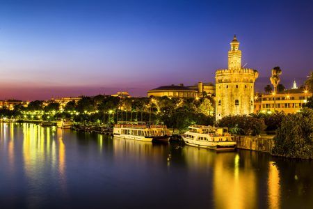 View of Golden Tower (Torre del Oro) of Seville, Andalusia, Spain over river Guadalquivir at sunset2