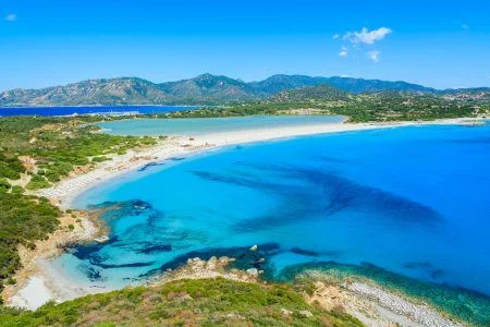 View of a beautiful bay with azure sea from top of a hill, Villasimius, Sardinia island, Italy