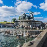 View of famous Gefion Fountain (Gefionspringvandet 1899) in Copenhagen. Gefion Fountain depicting legendary Norse goddess driving four oxen. It was designed by Danish artist Anders Bundgaard. Denmark.