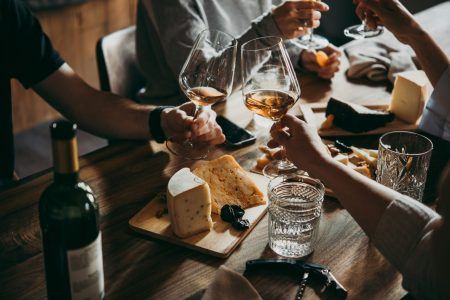 Wine and cheese are served for a friendly reception in the bar or restaurant.