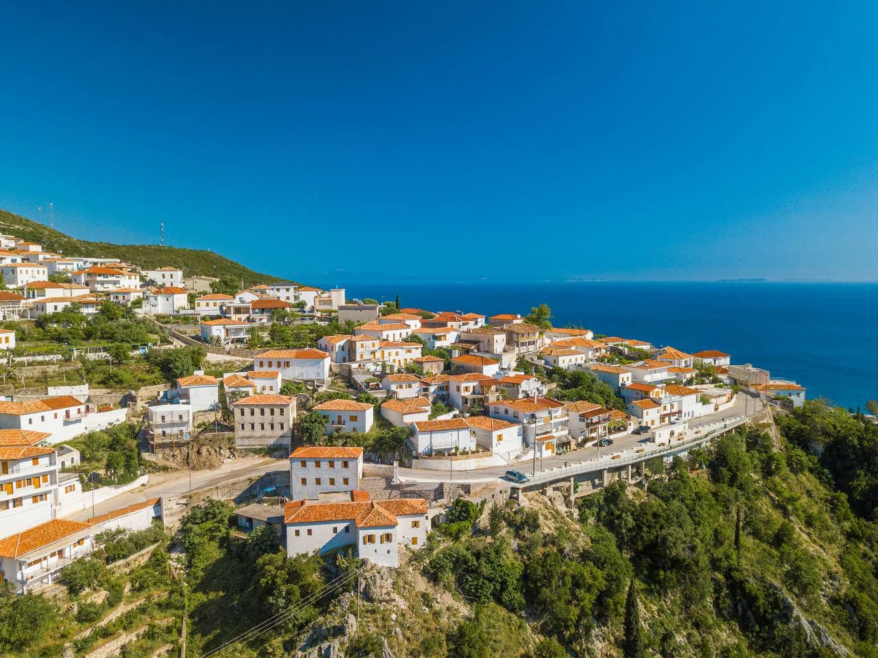 Aerial photo of the coastal village and the beach of Dhermi Albania