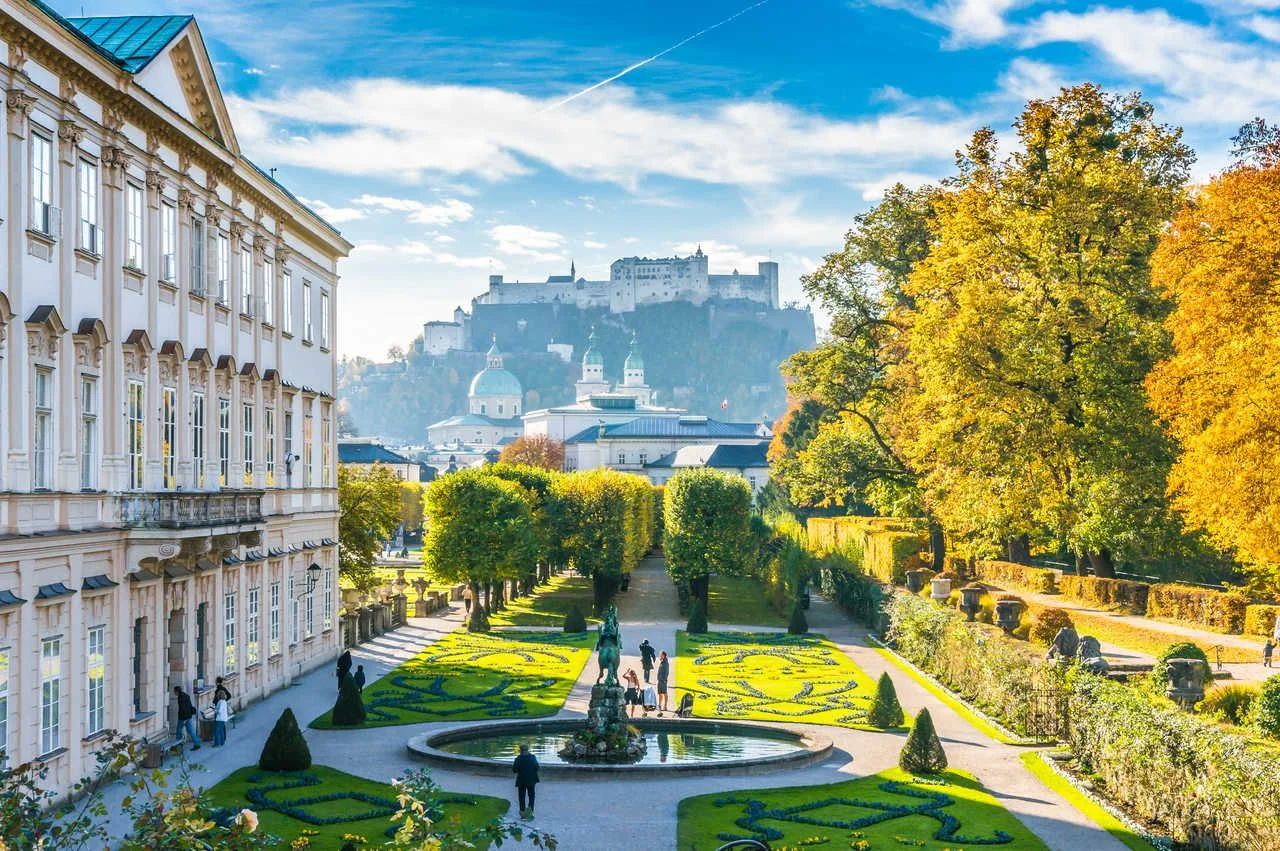 Beautiful view of the famous Mirabell Gardens with the historic Hohensalzburg Fortress in the background in Salzburg, Austria