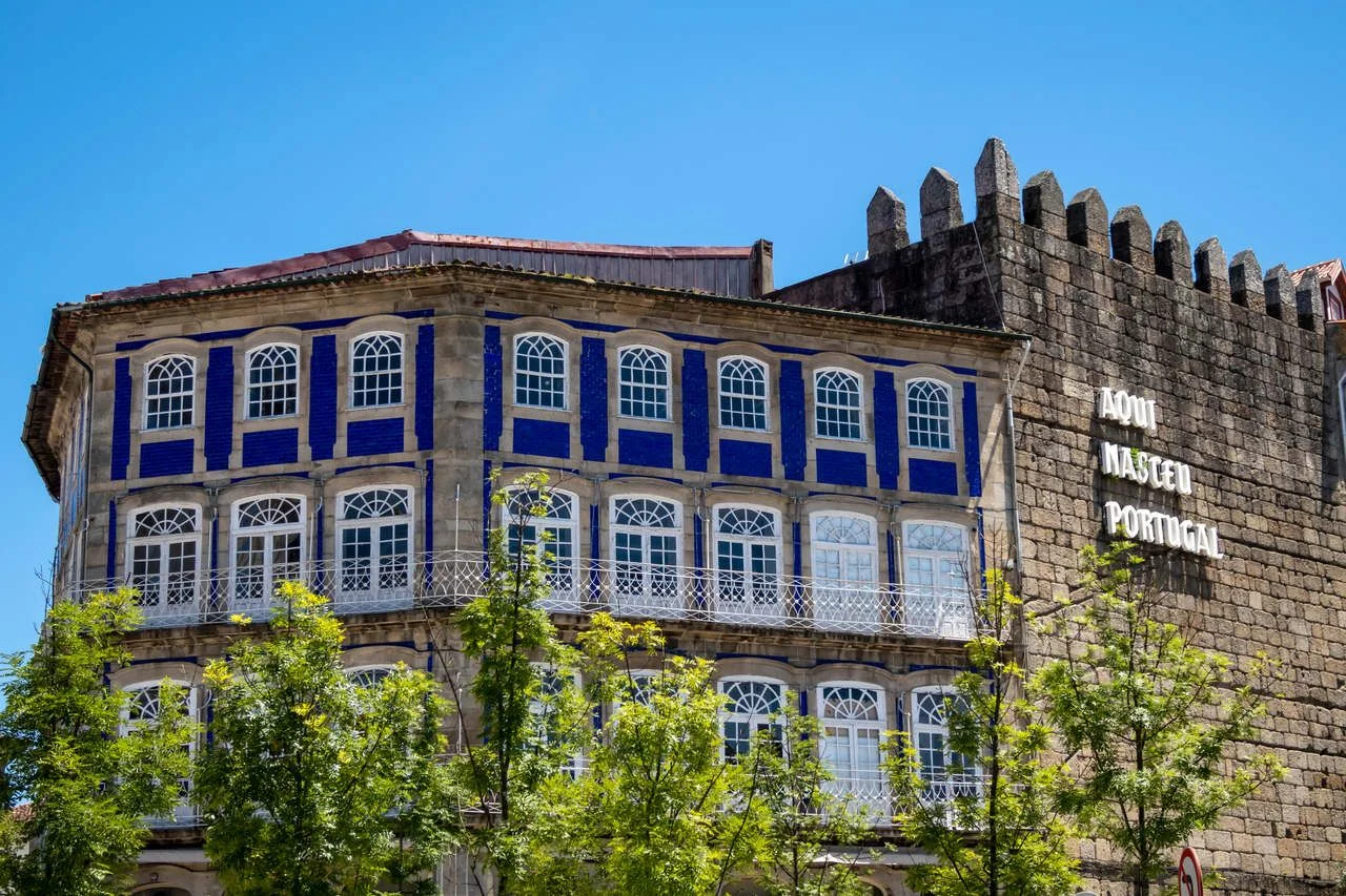 Guimarães city center wall it is written Aqui nasceu Portugal (Portugal was born here).
