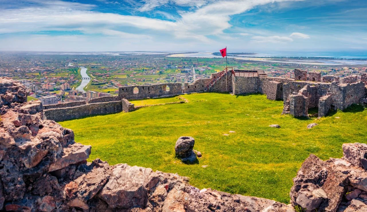 Magnificent spring view of ruins of Lezhe Fortress. Spectacular morning cityscape of Lezha town, Albania, Europe. Traveling concept background.