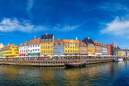 Nyhavn district is one of the most famous landmark in Copenhagen in a summer day, Denmark