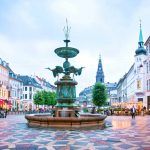 Stork Fountain on the Amagertorv (Amager Square) and the longest pedestrian street in the world Stroget in Copenhagen Copenhagen, Denmark.
