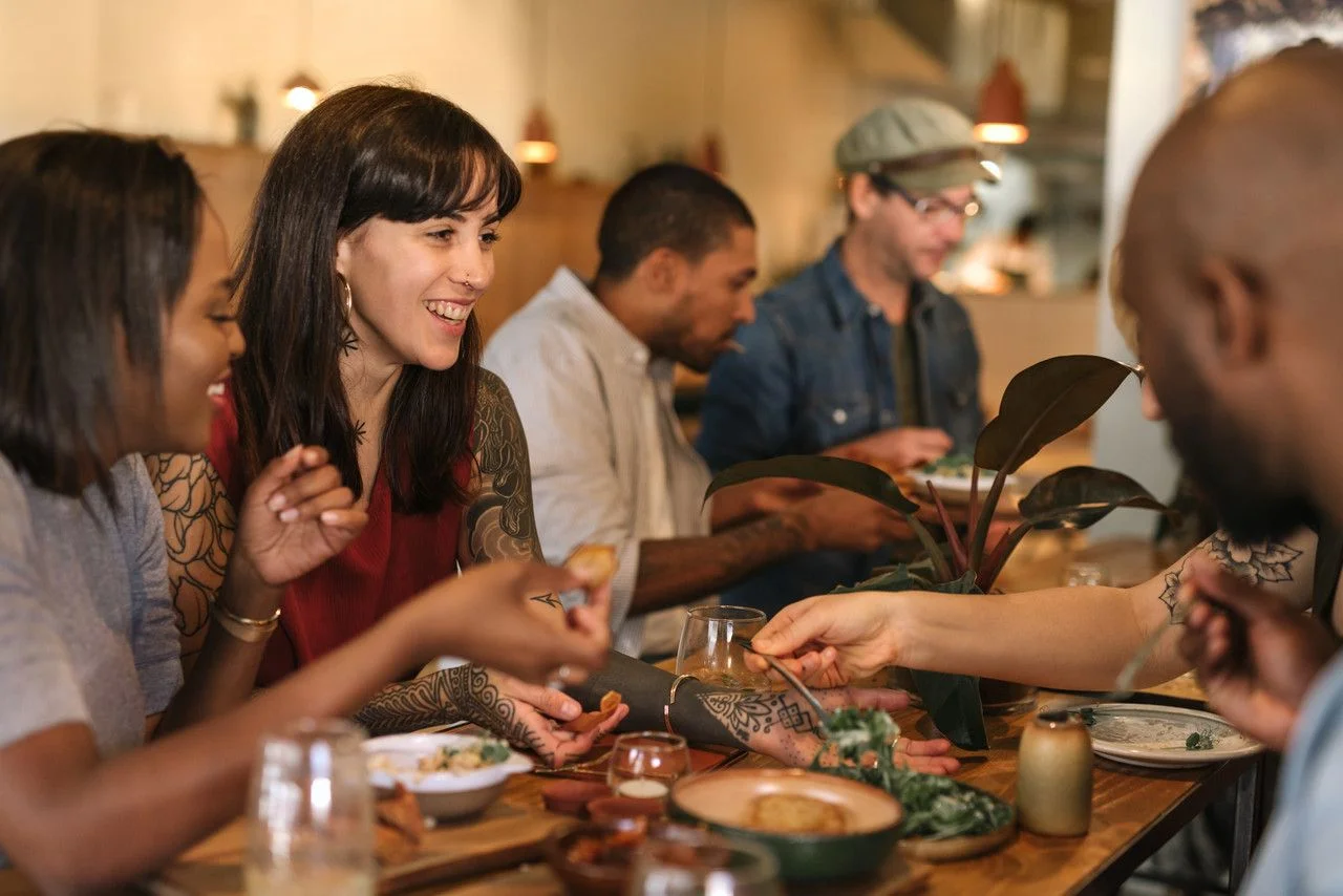 people eating tapas food party