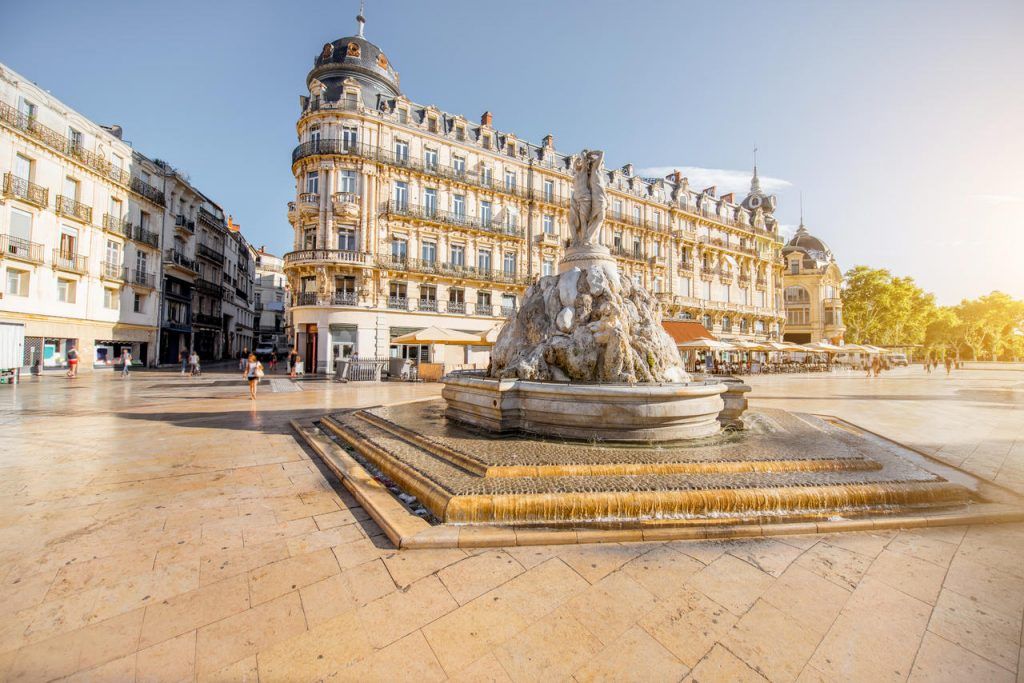 A view of Comedy Square with the Three Graces Fountain during the morning light in the city of Montpellier, southern France