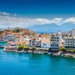 Agios Nikolaos, Crete, Greece. Agios Nikolaos is a picturesque town in the eastern part of the island of Crete built on the northwest side of the peaceful Mirabello Bay.