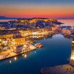 Rethymno city at Crete island in Greece. Aerial view of the old venetian harbor.